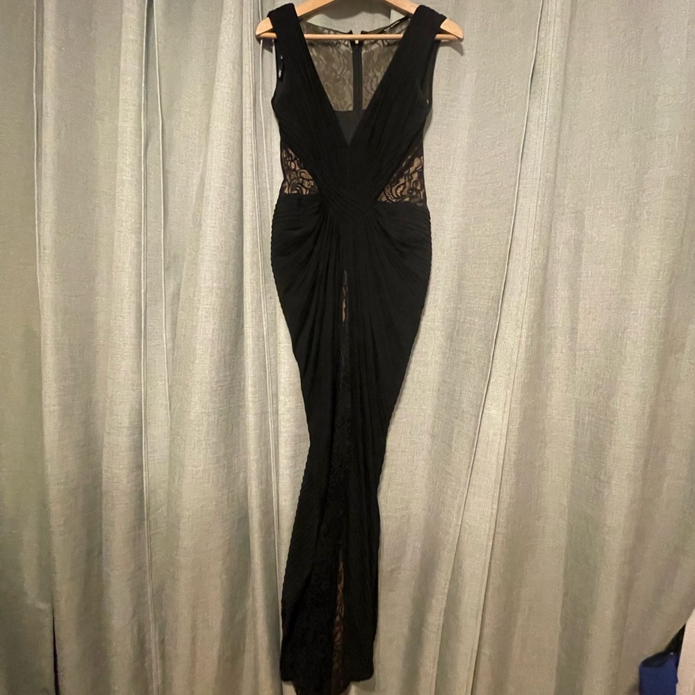 Black sleeveless dress with lace and skin color liner
